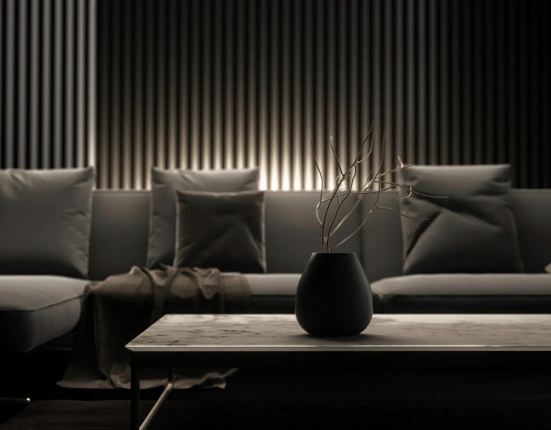 A calm living room in black and white: a low sofa, a stone table and a dark vase against slatted light